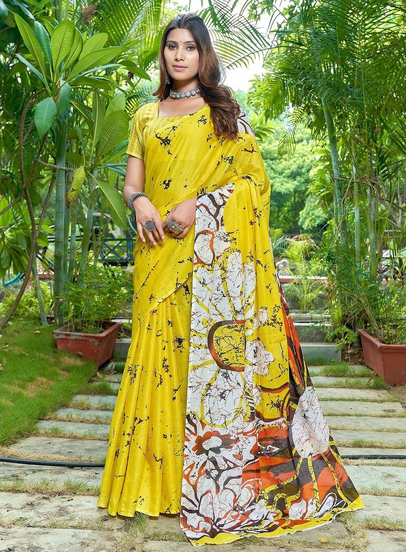Yellow printed mulmul cotton saree with blouse.