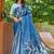 Blue printed mulmul cotton saree with blouse.