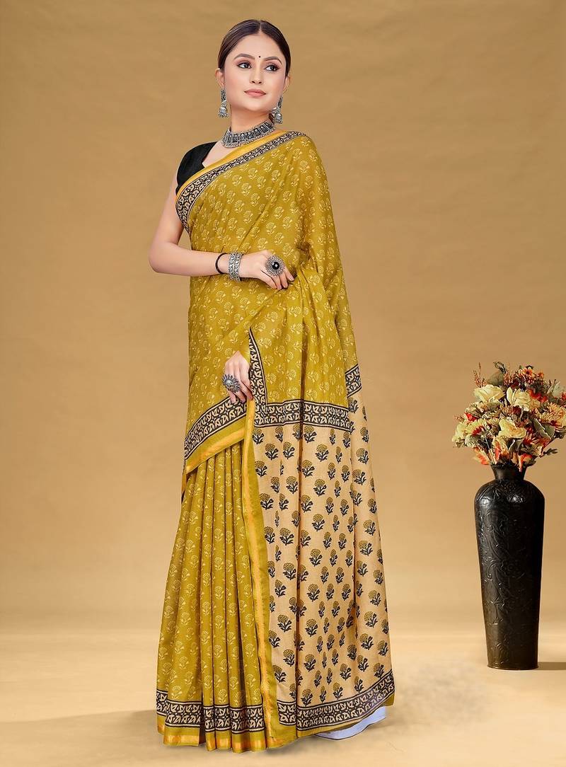 Mustard floral print muslin cotton saree with blouse.