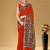 Rust floral print muslin cotton saree with blouse.