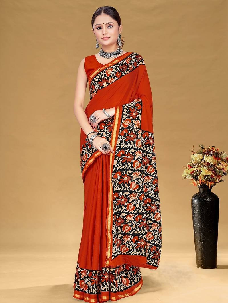 Rust floral print muslin cotton saree with blouse.