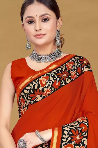 Rust floral print muslin cotton saree with blouse.