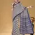 Navy blue floral print muslin cotton saree with blouse.