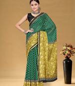 Teal green floral print muslin cotton saree with blouse.