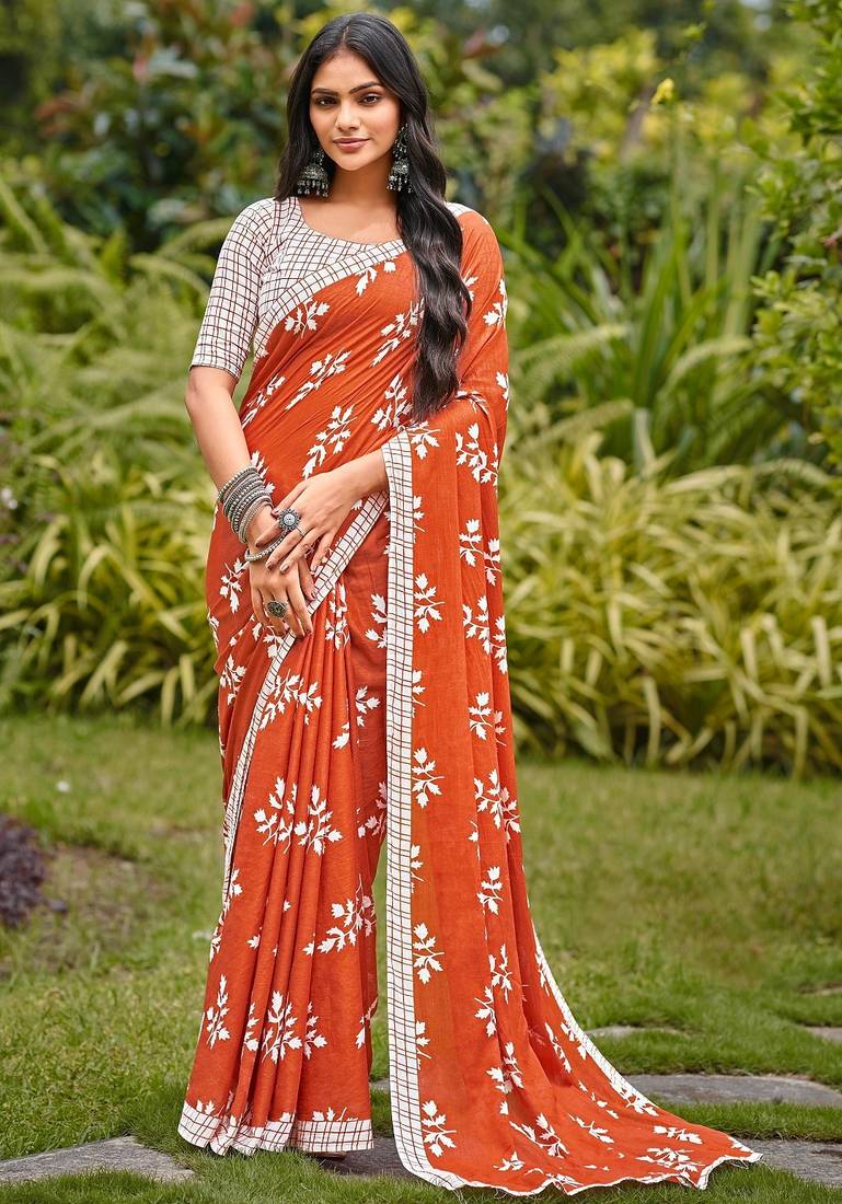 Rust floral print soft pure cotton saree with blouse.