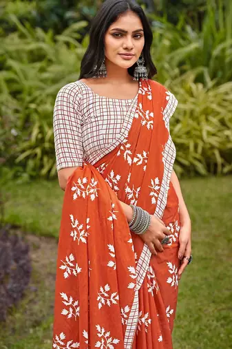 Rust floral print soft pure cotton saree with blouse.
