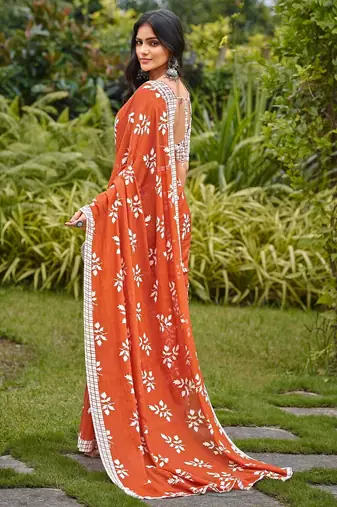 Rust floral print soft pure cotton saree with blouse.