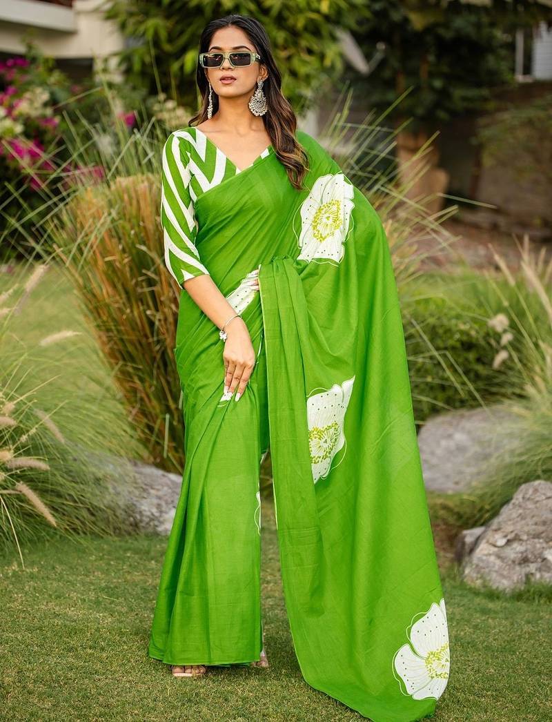 Green floral print soft pure cotton saree with blouse.