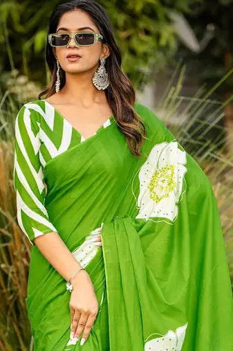 Green floral print soft pure cotton saree with blouse.