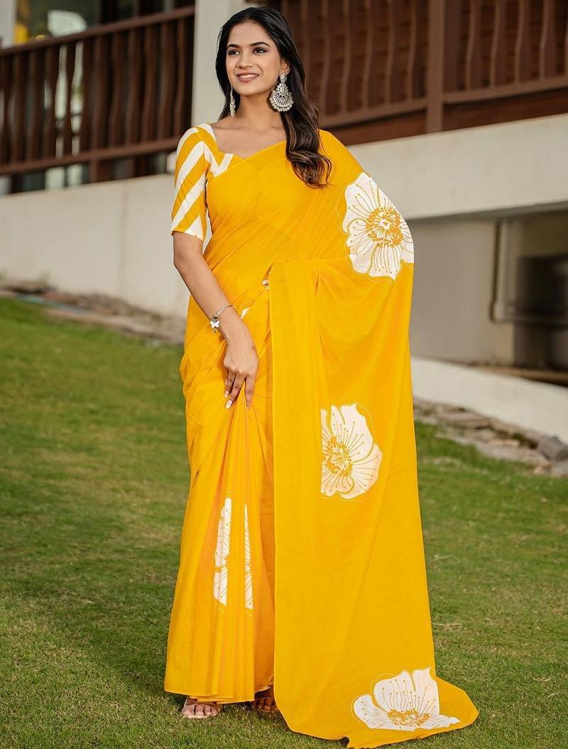 Yellow floral print soft pure cotton saree with blouse.