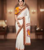 White kalamkari print mulmul cotton saree with blouse.