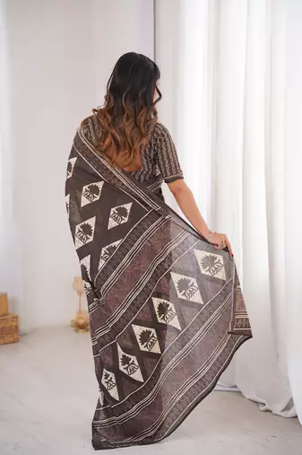Brown blocked printed, floral print, geometric print soft pure cotton saree with blouse.