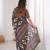 Brown blocked printed, floral print, geometric print soft pure cotton saree with blouse.