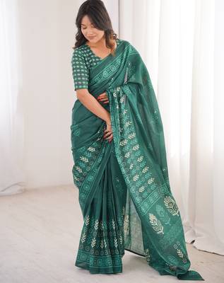 Green blocked printed, floral print soft pure cotton saree with blouse. 1