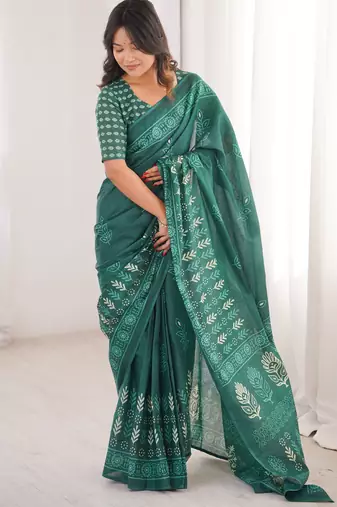 Green blocked printed, floral print soft pure cotton saree with blouse.
