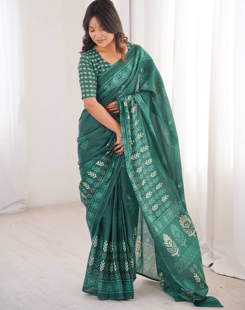 Green blocked printed, floral print soft pure cotton saree with blouse.
