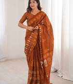 Mustard blocked printed, floral print soft pure cotton saree with blouse.