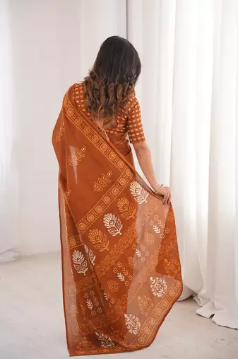Mustard blocked printed, floral print soft pure cotton saree with blouse.