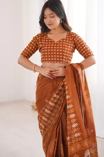 Mustard blocked printed, floral print soft pure cotton saree with blouse.