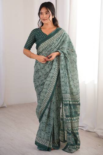 Green blocked printed, paisley soft pure cotton saree with blouse.