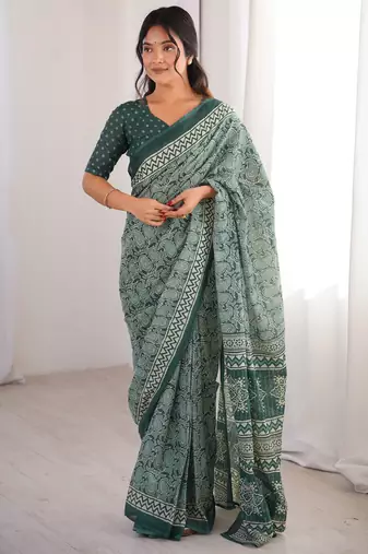Green blocked printed, paisley soft pure cotton saree with blouse.