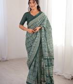 Green blocked printed, paisley soft pure cotton saree with blouse.