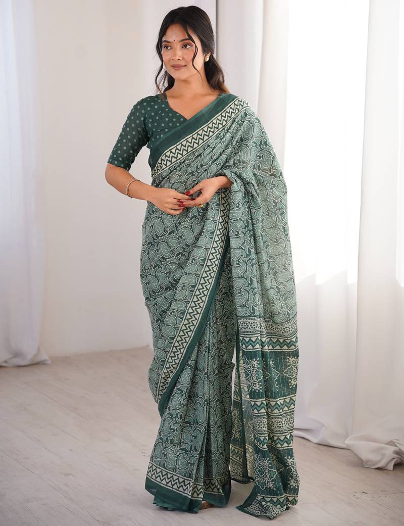 Green blocked printed, paisley soft pure cotton saree with blouse.