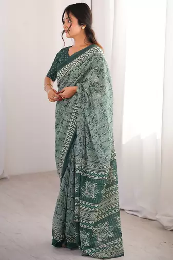 Green blocked printed, paisley soft pure cotton saree with blouse.