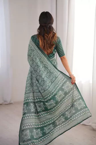 Green blocked printed, paisley soft pure cotton saree with blouse.