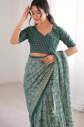 Green blocked printed, paisley soft pure cotton saree with blouse.