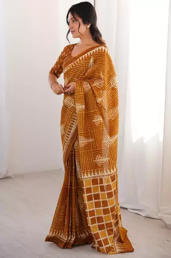 Mustard blocked printed, floral print, geometric print soft pure cotton saree with blouse.