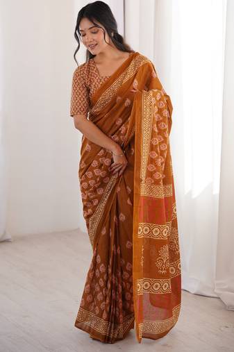 Mustard blocked printed, floral print soft pure cotton saree with blouse.