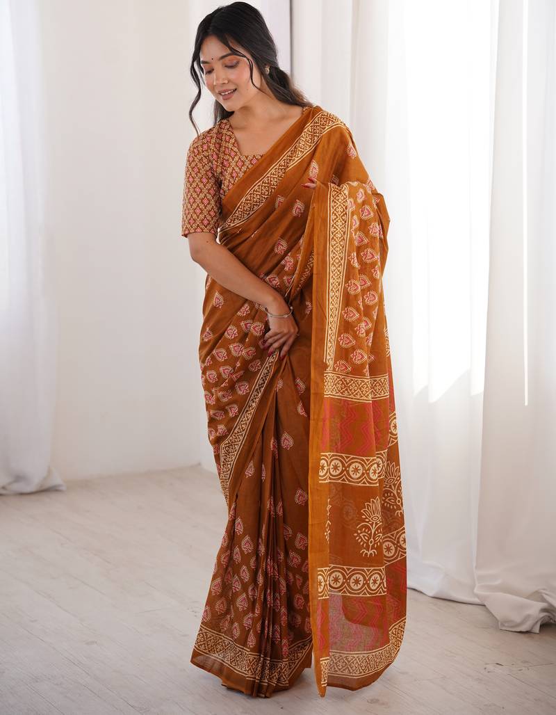 Mustard blocked printed, floral print soft pure cotton saree with blouse.