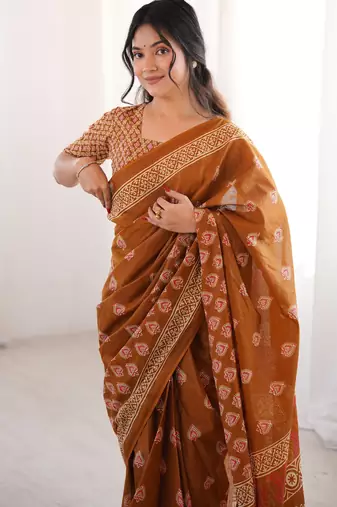 Mustard blocked printed, floral print soft pure cotton saree with blouse.