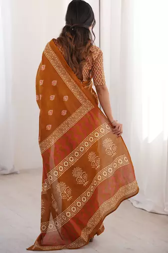 Mustard blocked printed, floral print soft pure cotton saree with blouse.