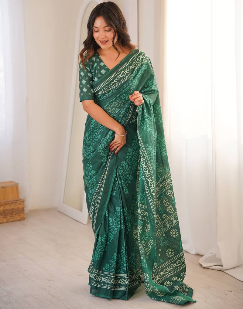 Green blocked printed, floral print soft pure cotton saree with blouse.