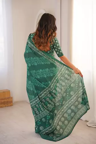 Green blocked printed, floral print soft pure cotton saree with blouse.