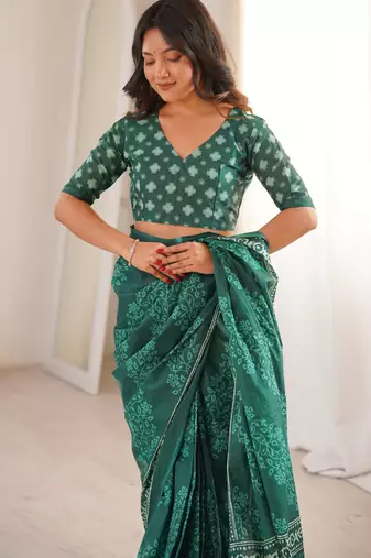 Green blocked printed, floral print soft pure cotton saree with blouse.