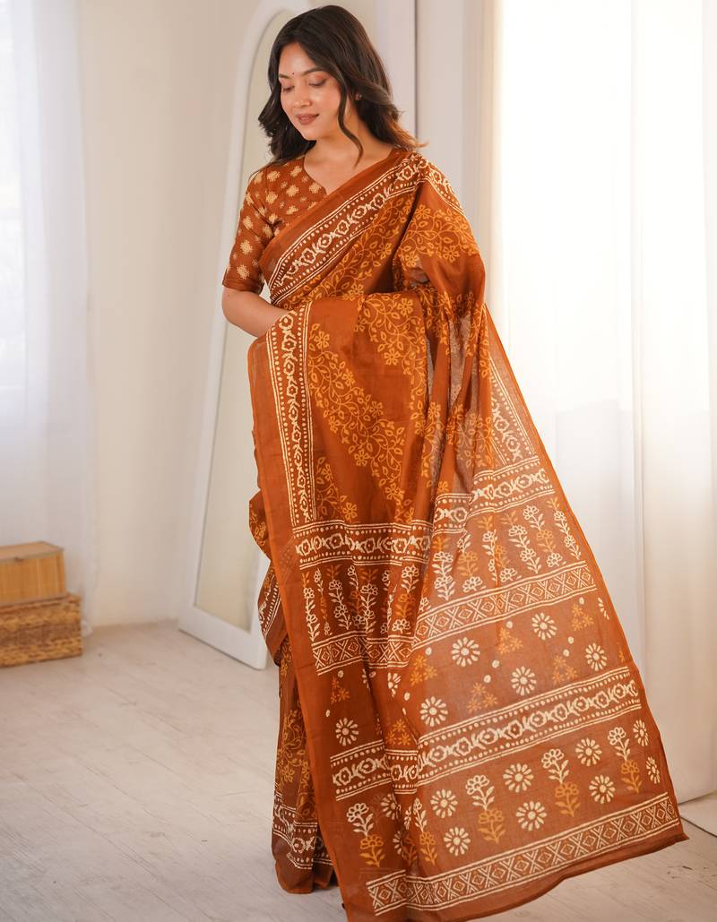 Mustard blocked printed, floral print soft pure cotton saree with blouse.