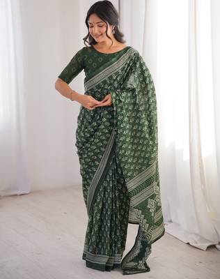 Green blocked printed, floral print soft pure cotton saree with blouse. 1