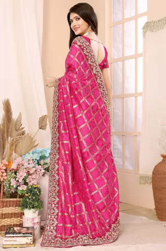 Pink bandhani printed vichitra silk saree with embroidered border