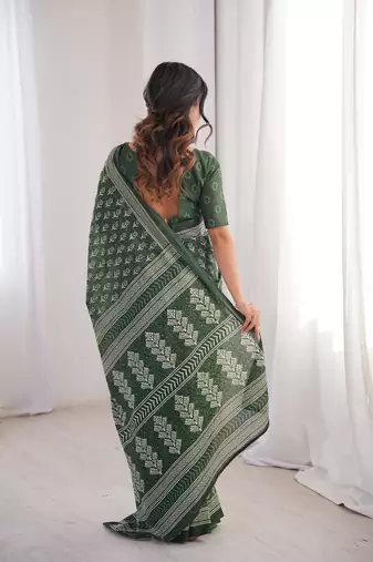 Green blocked printed, floral print soft pure cotton saree with blouse.