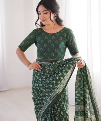 Green blocked printed, floral print soft pure cotton saree with blouse. 5