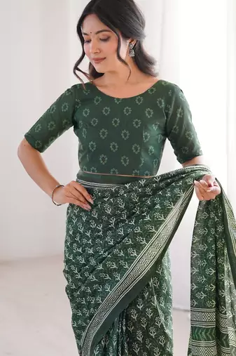 Green blocked printed, floral print soft pure cotton saree with blouse.