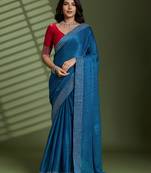 Teal silk blend chiffon embellished saree with unstitched blouse piece