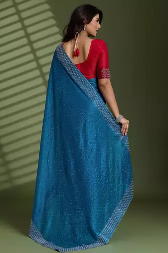 Teal silk blend chiffon embellished saree with unstitched blouse piece