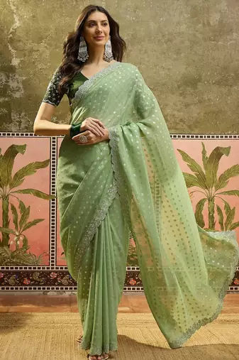 Green georgette embroidered saree with unstitched blouse piece
