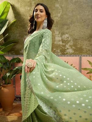 Green georgette embroidered saree with unstitched blouse piece 2