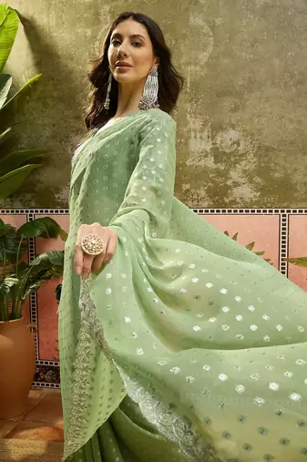 Green georgette embroidered saree with unstitched blouse piece