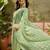 Green georgette embroidered saree with unstitched blouse piece